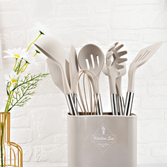 Beige silicone kitchen utensil set in its holder