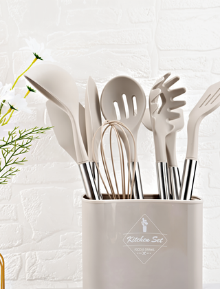 Beige silicone kitchen utensil set in its holder