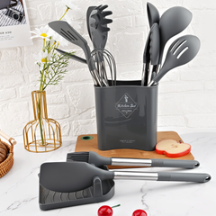 Black utensil set displayed beside the holder