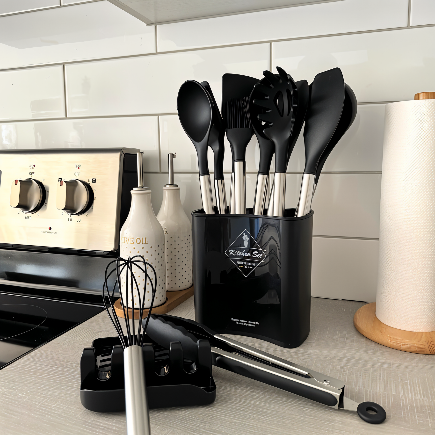 Black utensil set beside a stove
