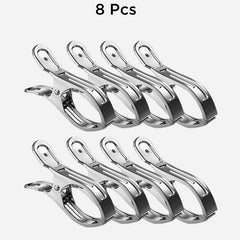 Eight matching stainless steel household clips