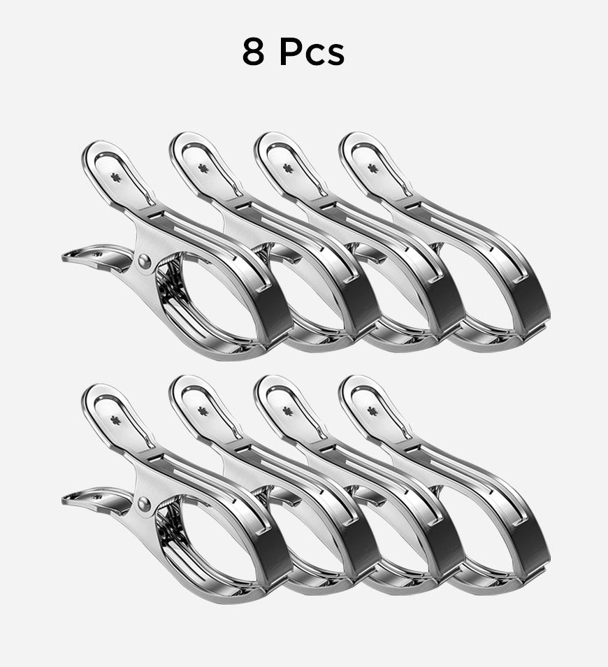 Eight matching stainless steel household clips