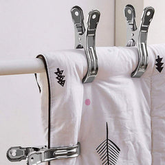 Household clips securing towels and small garments