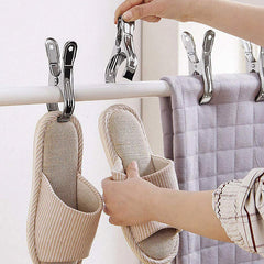 Stainless steel clips used with towels, a blanket, and slippers