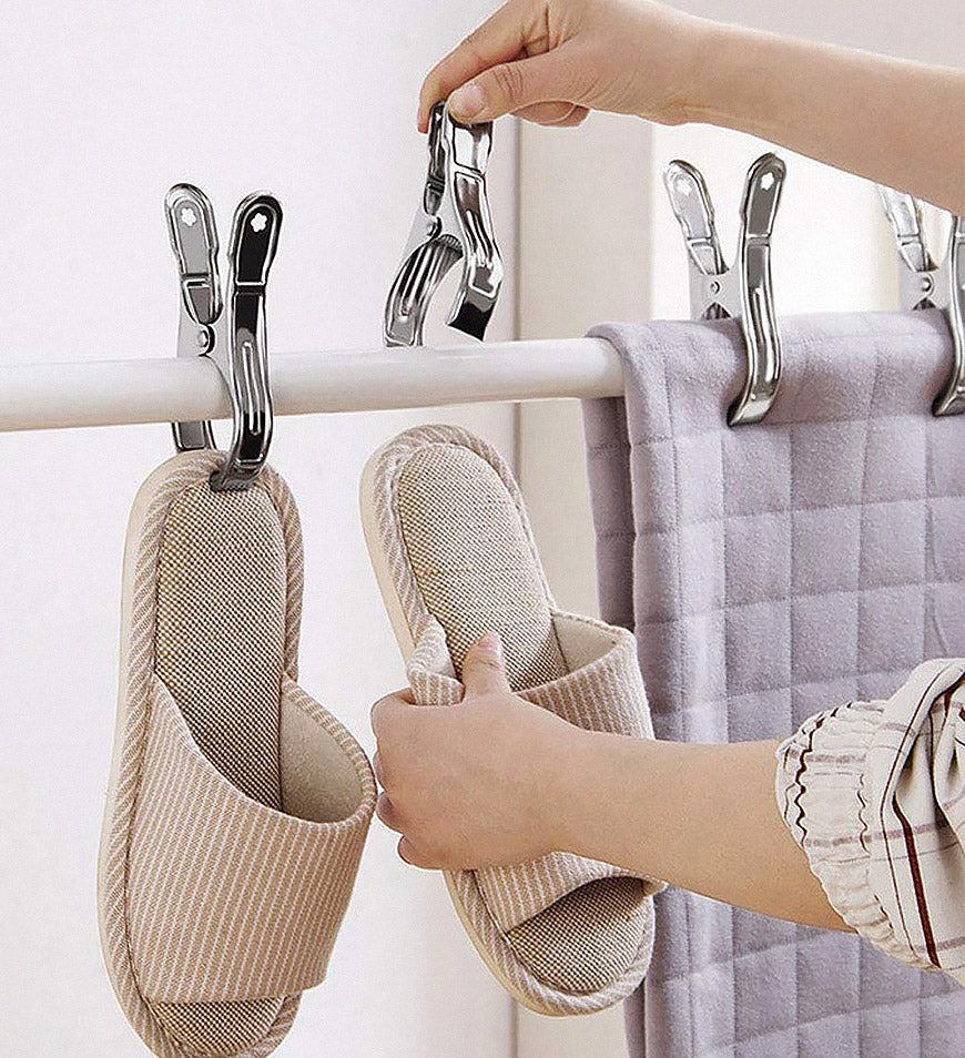Stainless steel clips used with towels, a blanket, and slippers