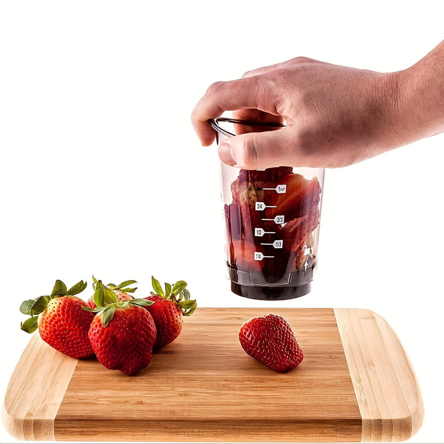 Manual food cutter used with strawberries