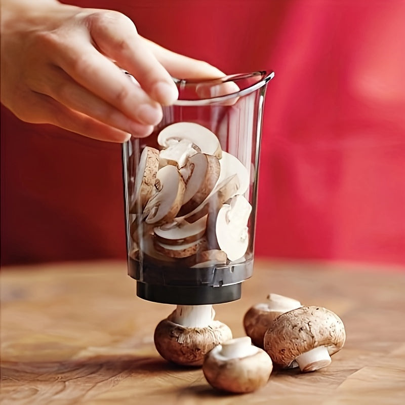 Manual food cutter chopping mushrooms