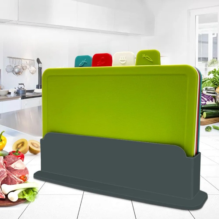 Four color-coded cutting boards in a gray holder