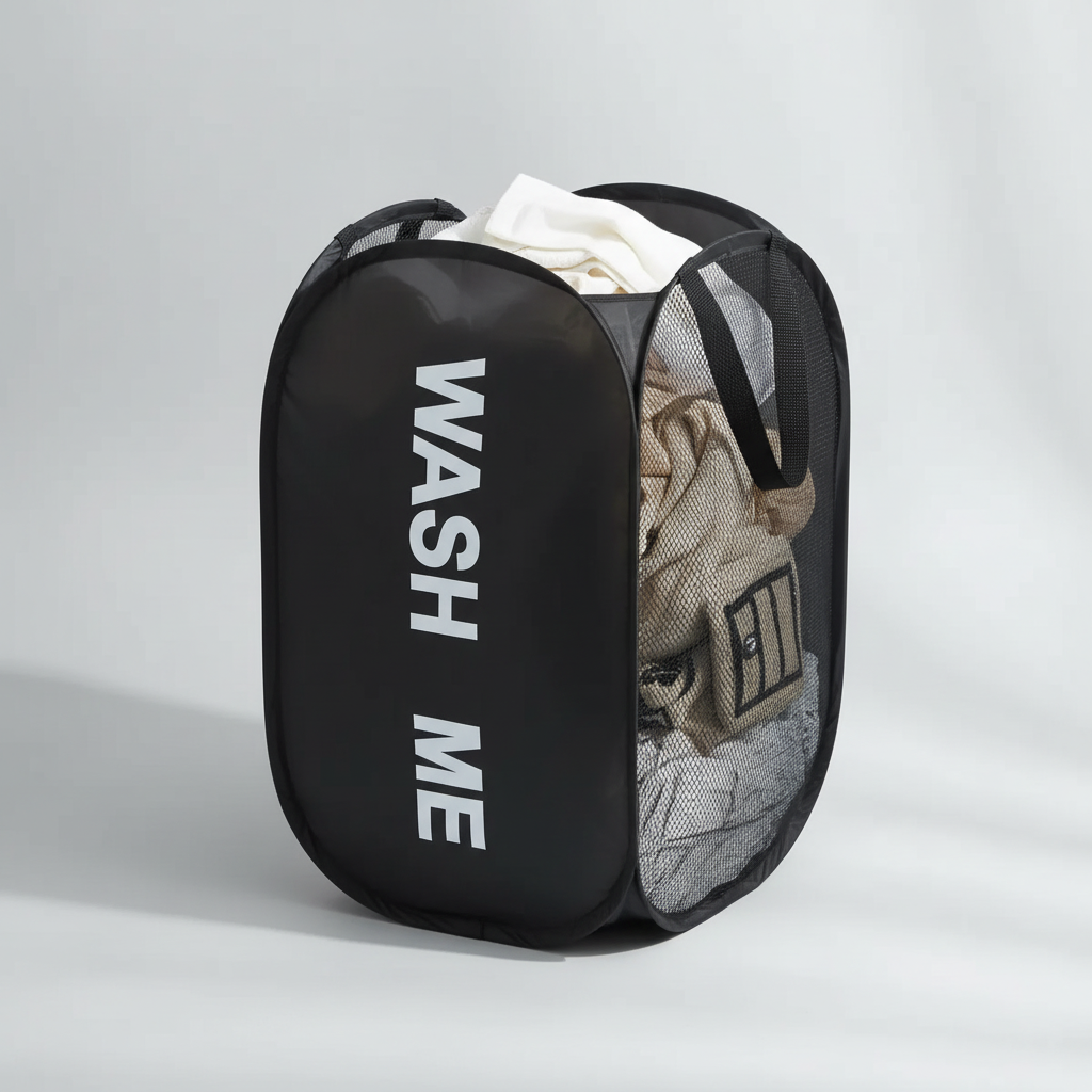 Black mesh laundry basket filled with clothes