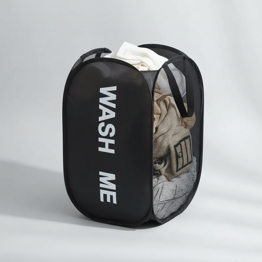 Black mesh laundry basket filled with clothes