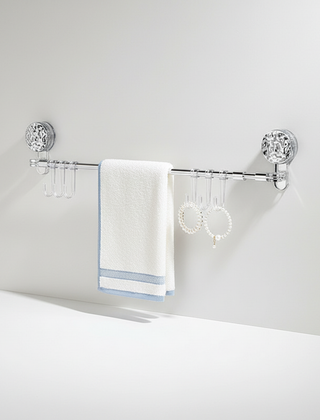 Clear retractable wall hook rack on a light wall