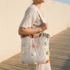 Beige crochet everyday tote bag carried over the shoulder