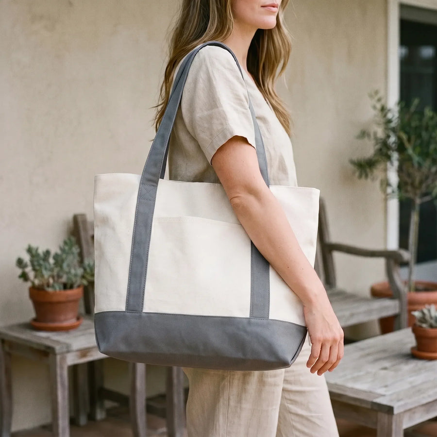 Gray everyday canvas tote bag carried over the shoulder