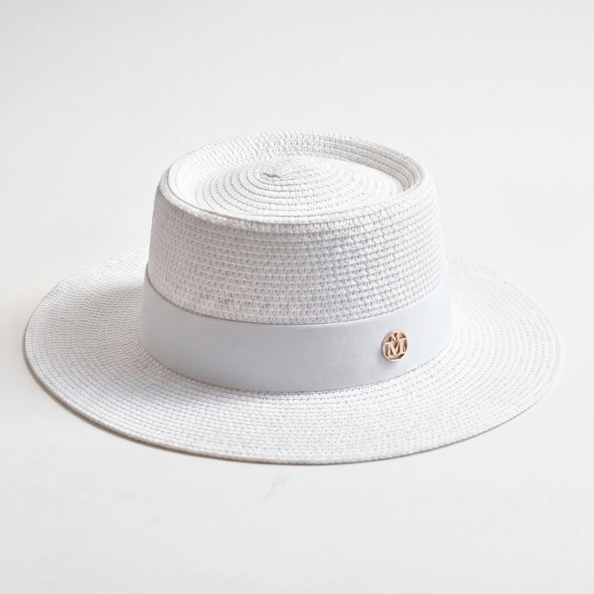 White flat-top woven sun hat