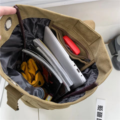 Open Khaki rucksack showing its main compartment