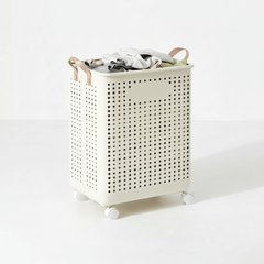 Cream collapsible laundry basket on wheels