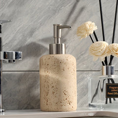 Resin soap dispenser displayed on a bathroom counter
