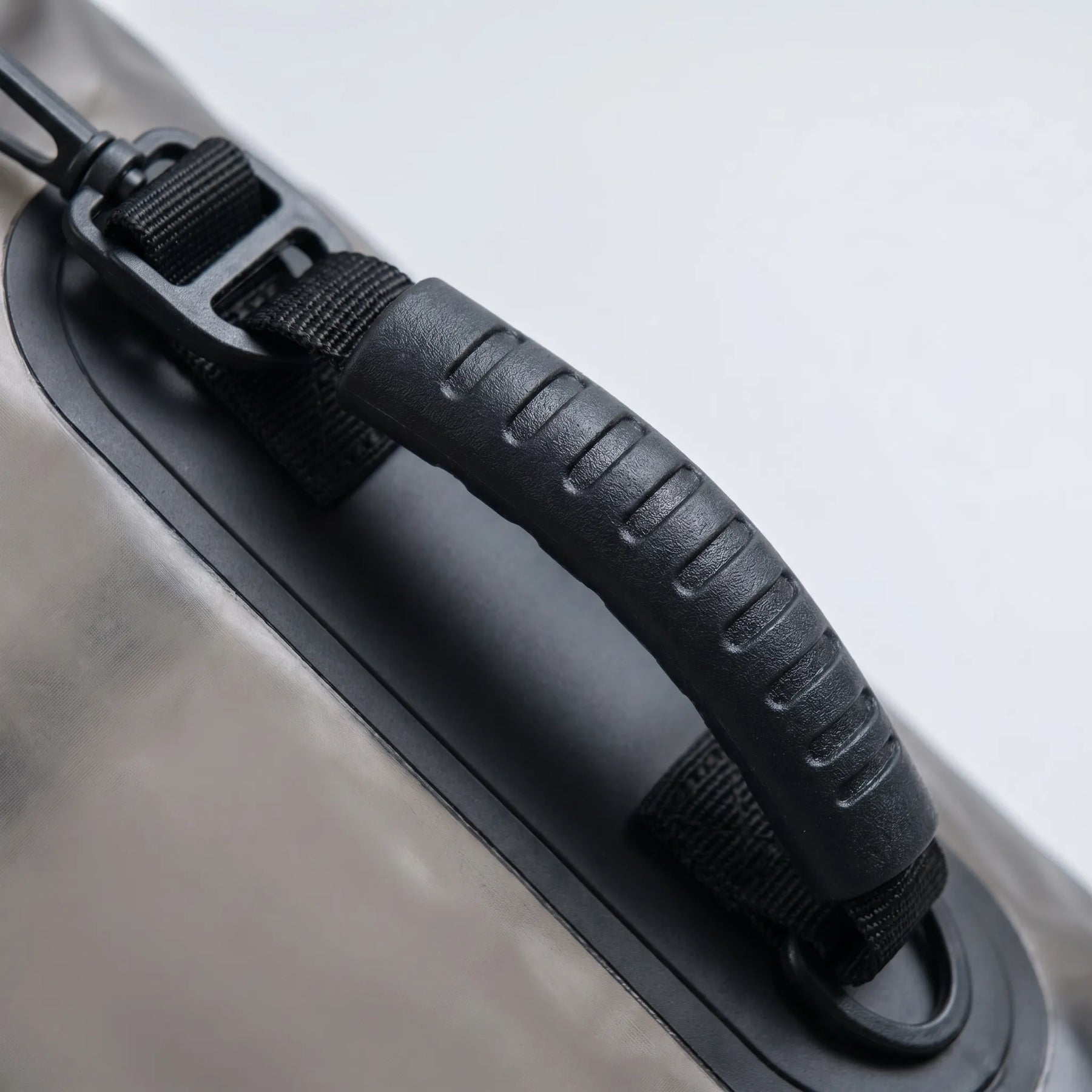 Close view of the carry handle and strap attachment