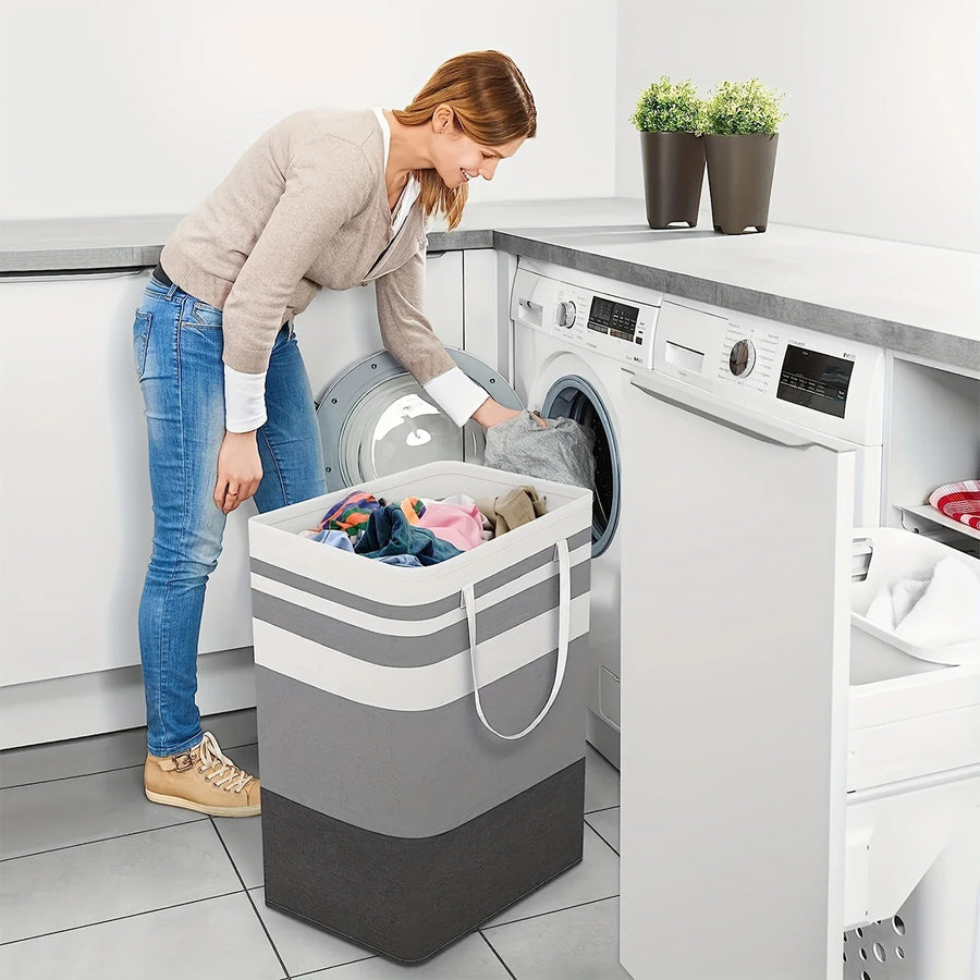 Striped collapsible laundry hamper in a laundry room