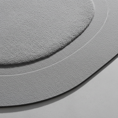 Close view of the textured surface and inset border