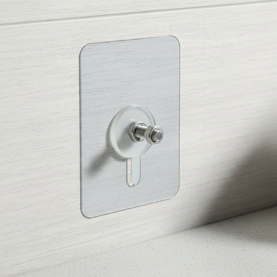 Clear self-adhesive mounting pad with threaded stud
