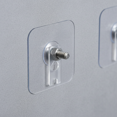 Close view of the threaded stud on an adhesive mounting pad