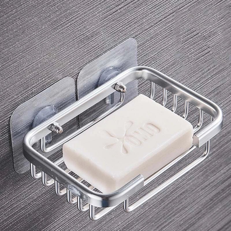 Soap dish attached with two clear threaded mounting pads