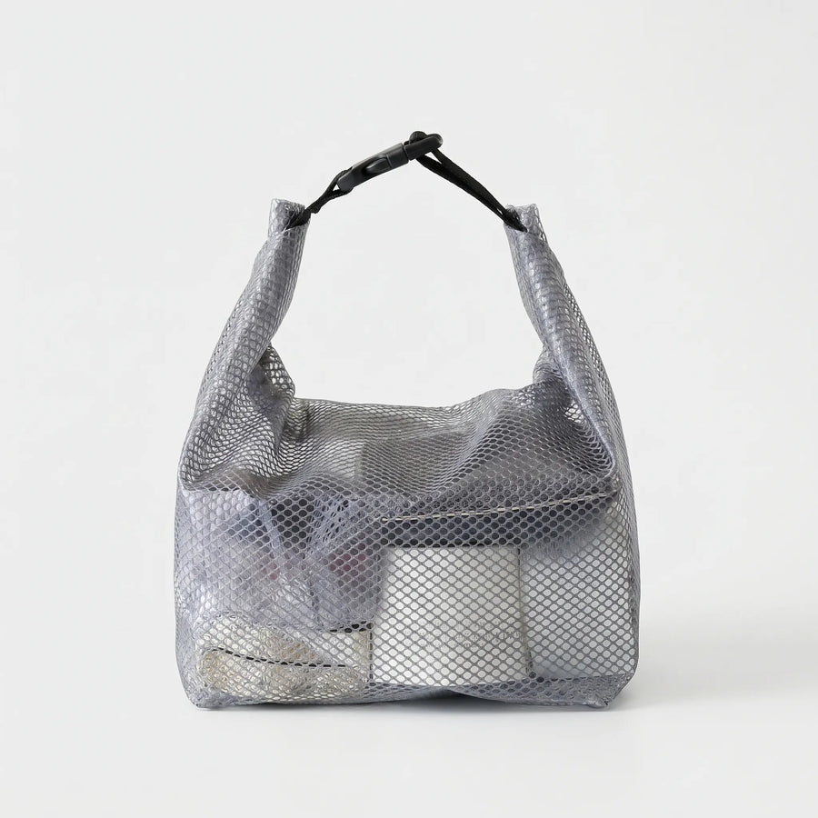 Black semi-transparent storage bag with toiletries
