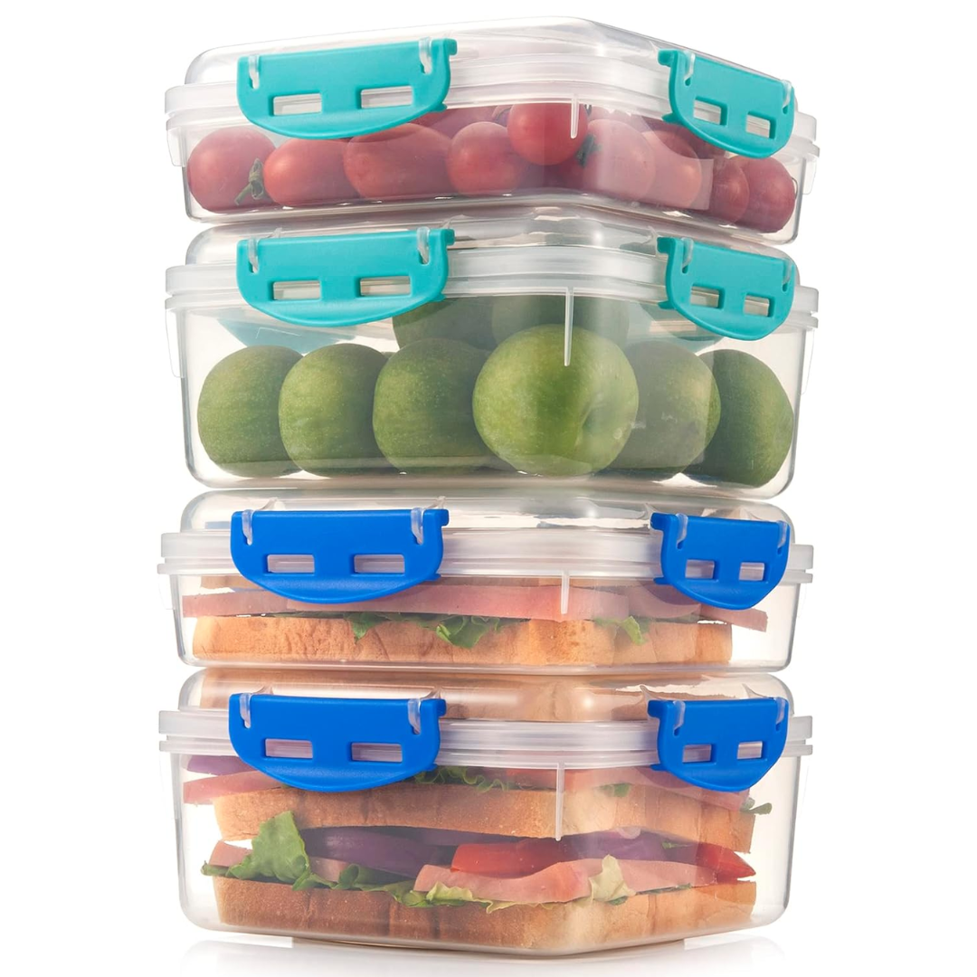 Four filled lunch containers stacked by height