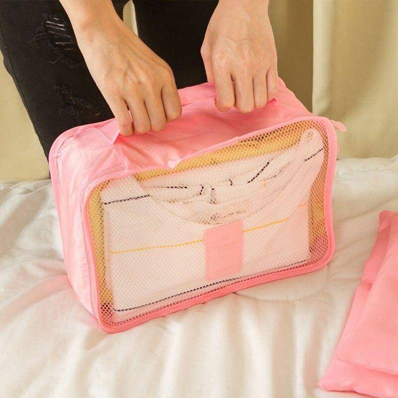 Zip opening on a Pink mesh packing organizer