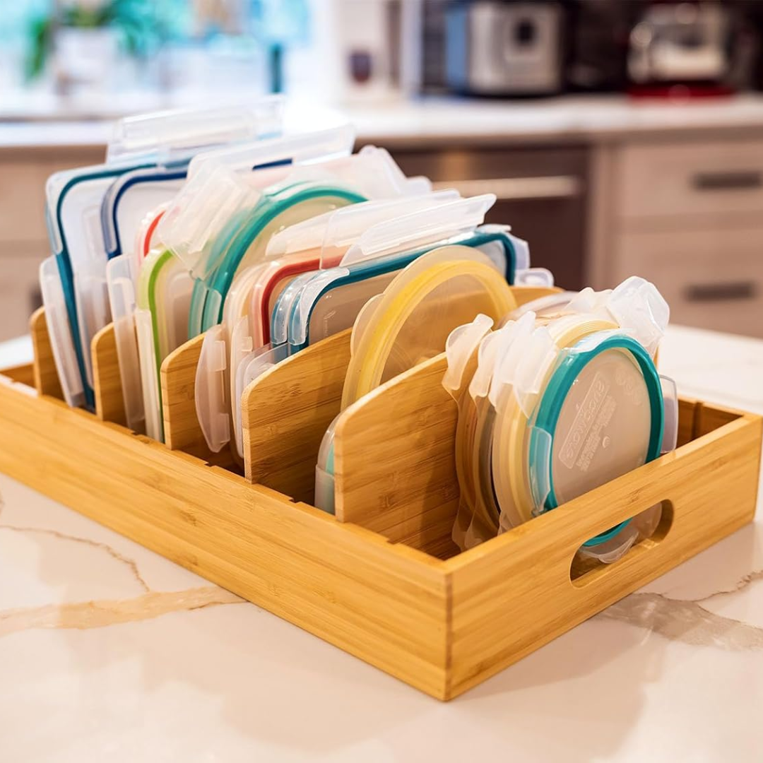 Container lids sorted upright in a bamboo organizer