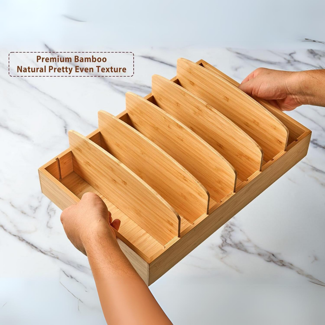 Bamboo organizer held above a kitchen counter