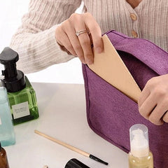 Front pocket on the Purple hanging toiletry bag