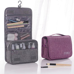 Gray and Purple hanging toiletry bags shown open and closed
