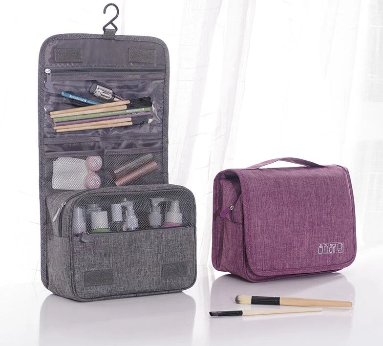 Gray and Purple hanging toiletry bags shown open and closed