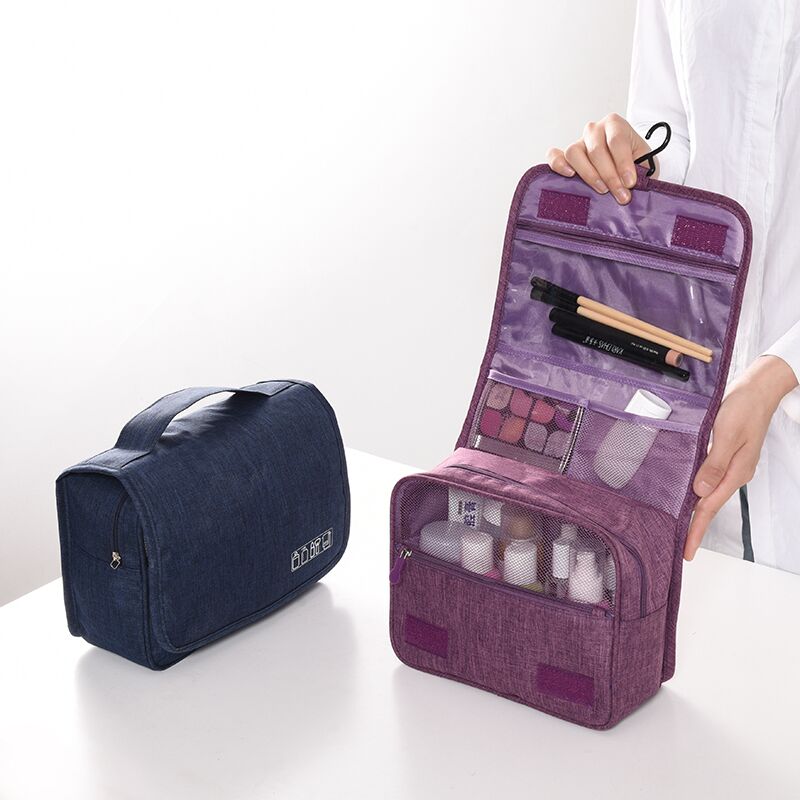 Dark Blue and Purple toiletry bags open for vertical access