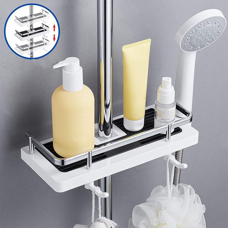 Side view of the shower caddy beside a handheld shower head