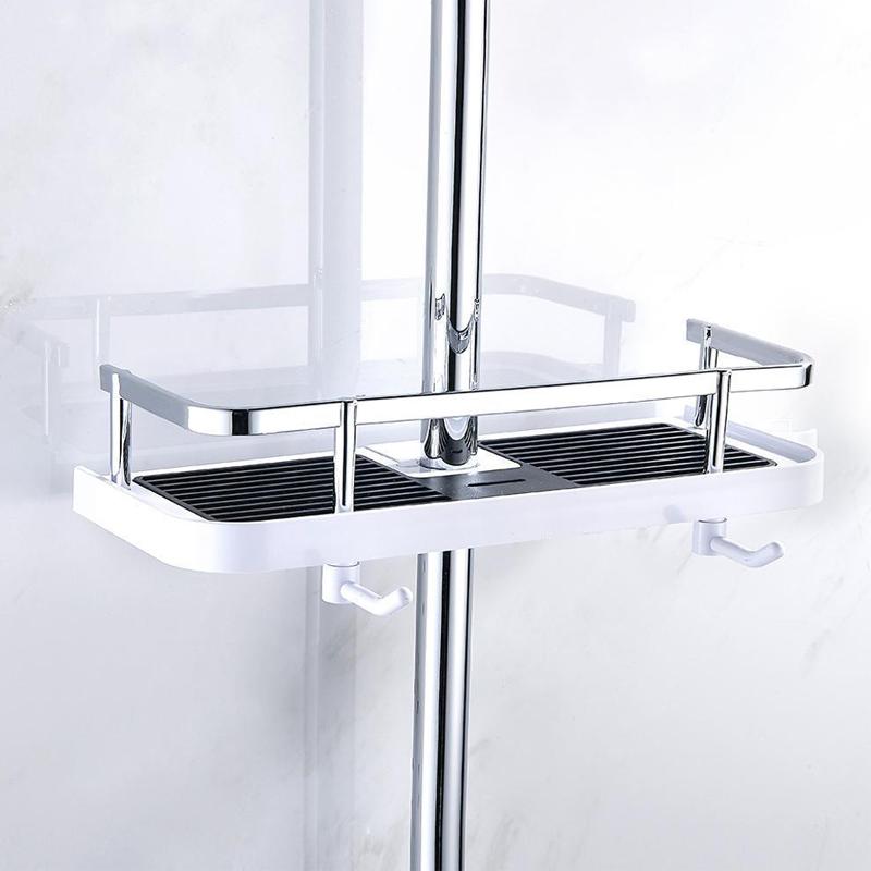 Compact shower caddy attached around a vertical shower riser
