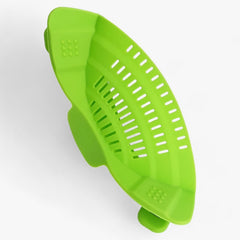Green clip-on silicone pot strainer
