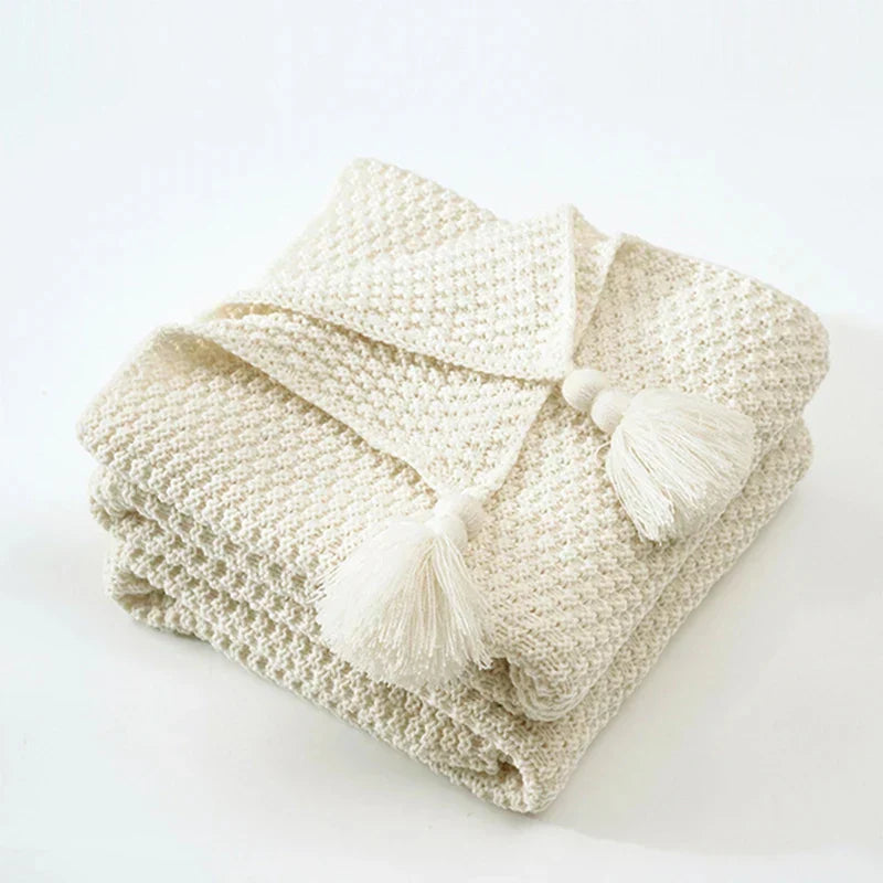 Folded Beige knitted tassel throw