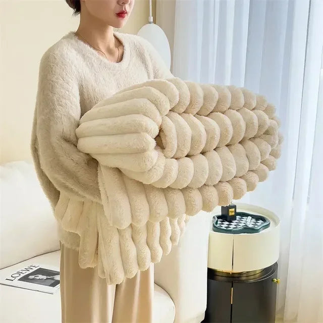 Folded Cream plush ribbed blanket