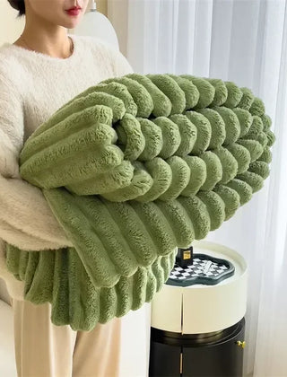 Folded Green plush ribbed blanket