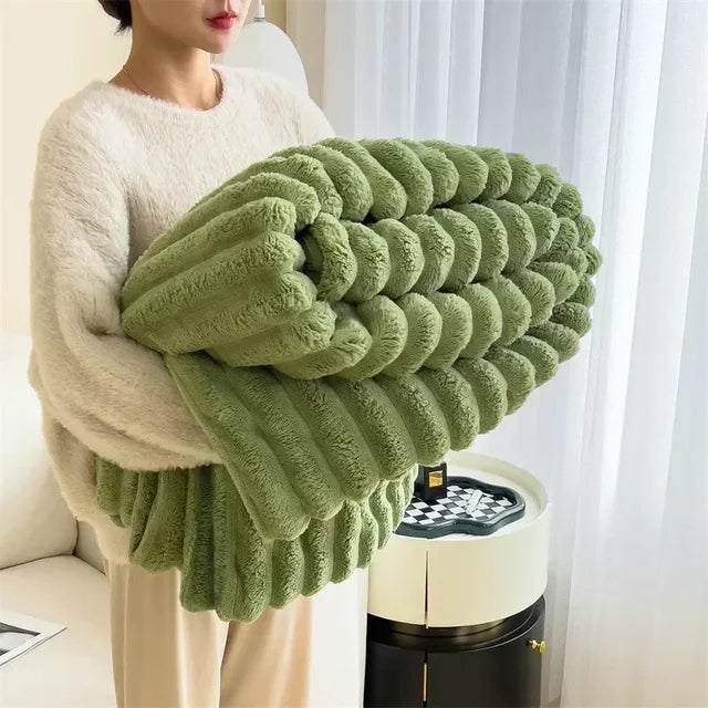 Folded Green plush ribbed blanket