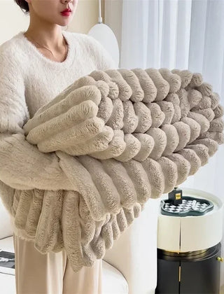 Folded Light Gray plush ribbed blanket