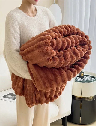Folded Caramel plush ribbed comfort blanket