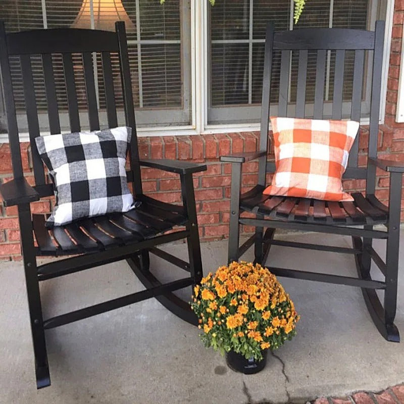 Black-White and Orange plaid cushions styled on porch chairs