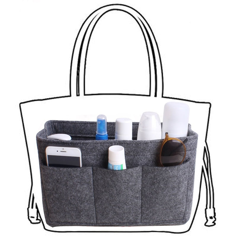Felt handbag organizer insert positioned inside a tote bag