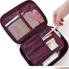 Interior divider and mesh pockets in a makeup organizer
