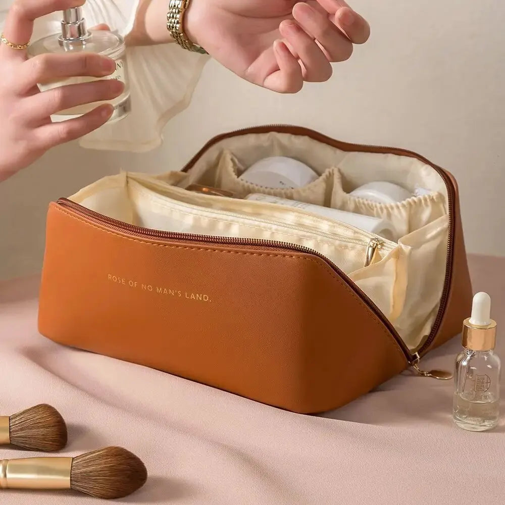 Brown toiletry bag interior dividers and elastic holders