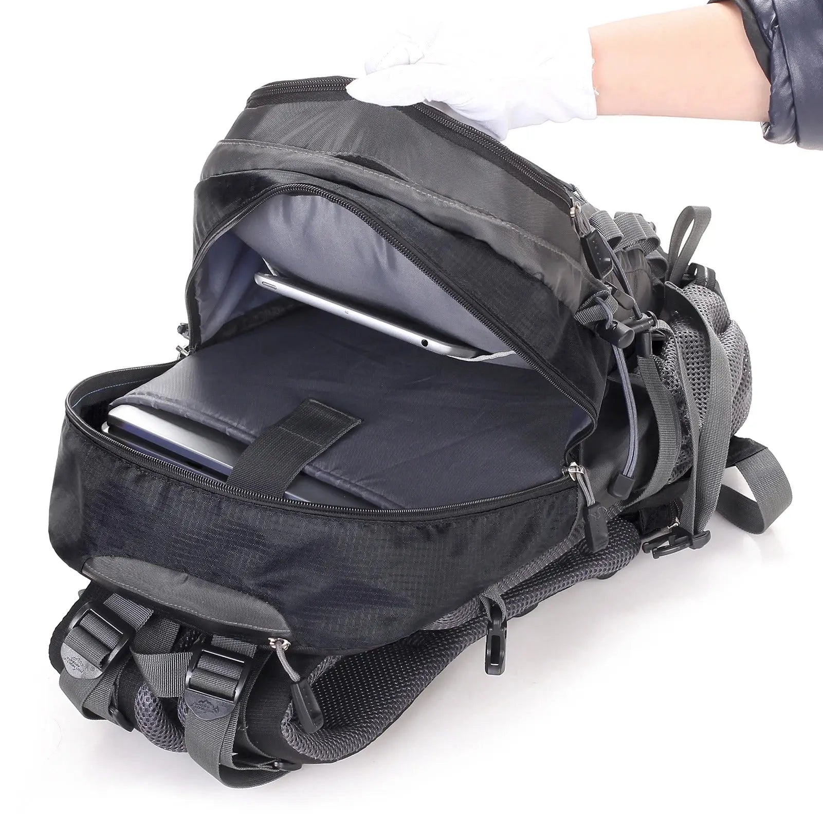 Open Black hiking backpack showing its main compartments